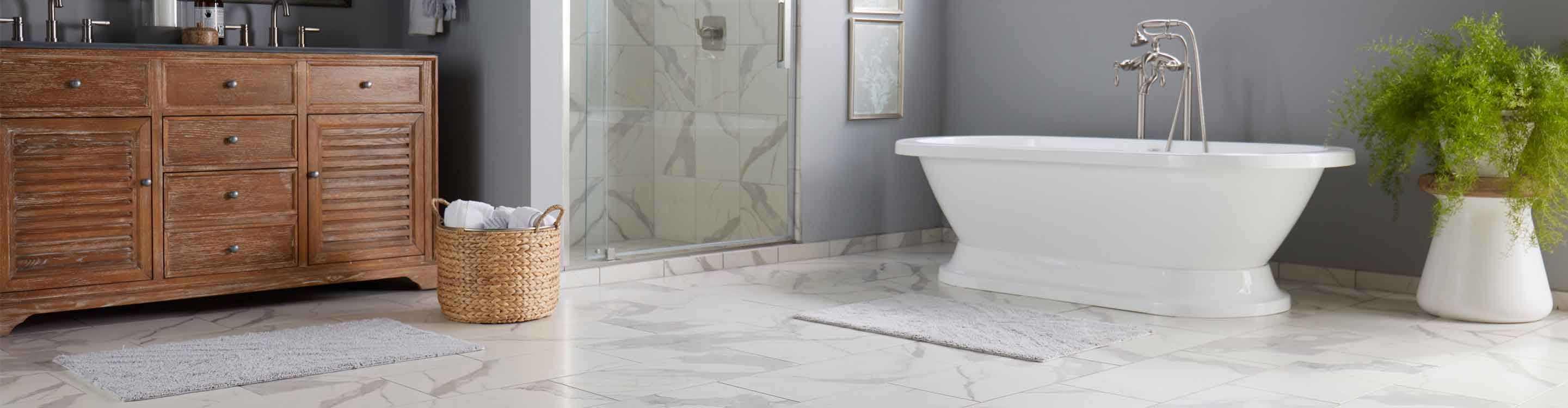 tile flooring in bathroom with bathtub