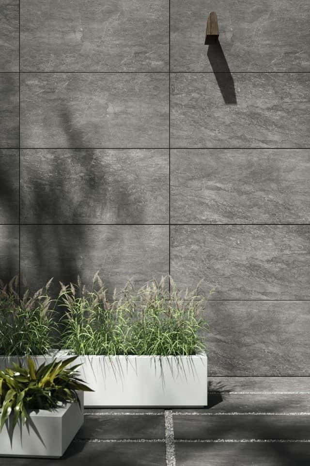 Consulate by Daltile oversized gray tiles on exterior wall